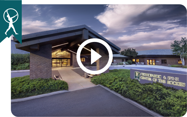 image of a doctor's office with a video icon on top of it