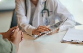 doctor using a tablet showing a patient information