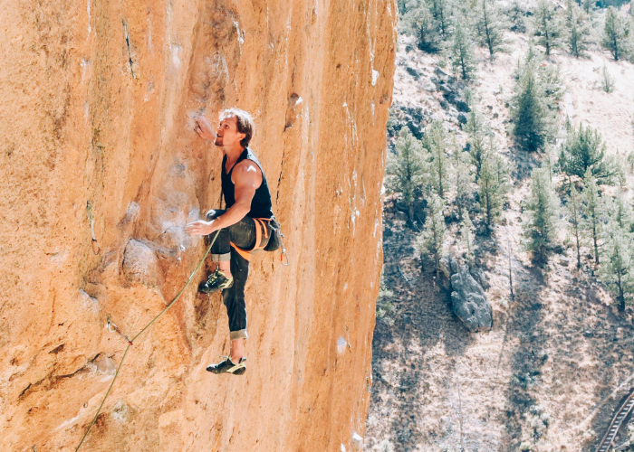 a man rock climbing