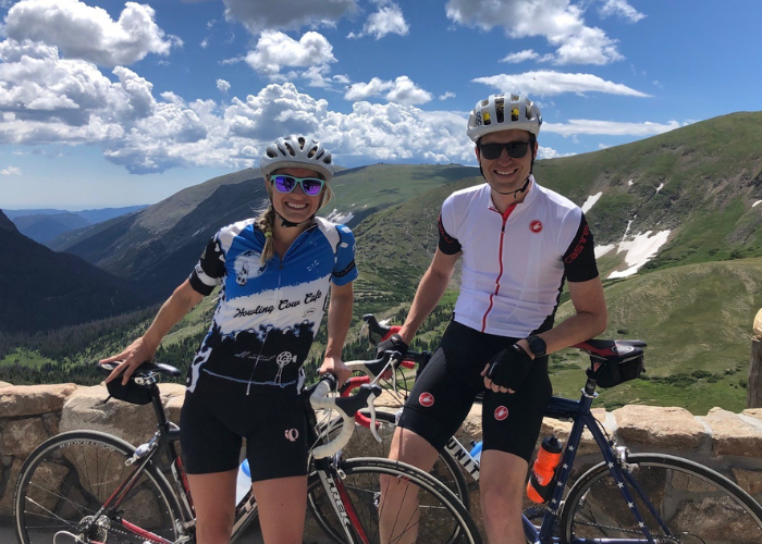 a man and a woman on bikes