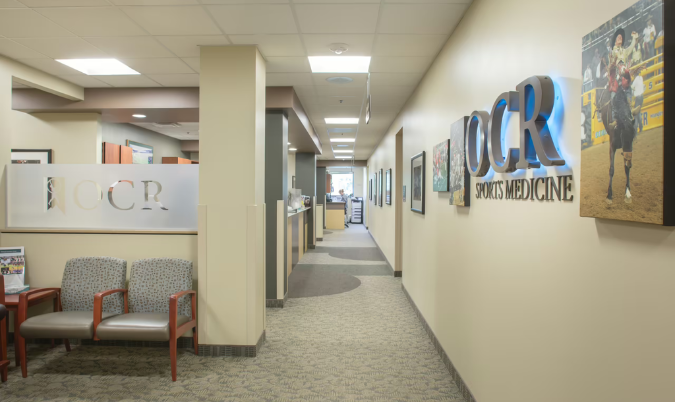 inside of medical clinic, OCR logo on the wall