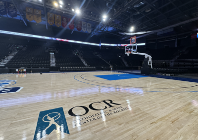 The OCR logo on the basketball court