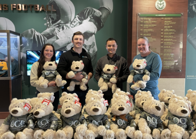 Members of the OCR cast team holding bears