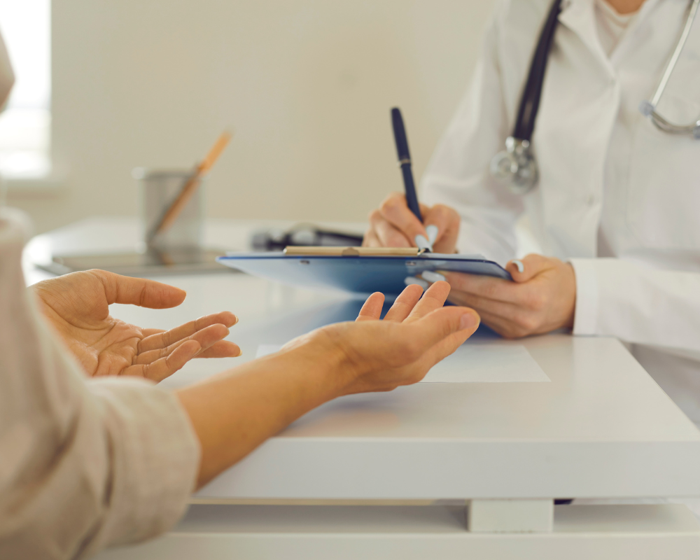 A doctor meeting with a patient.